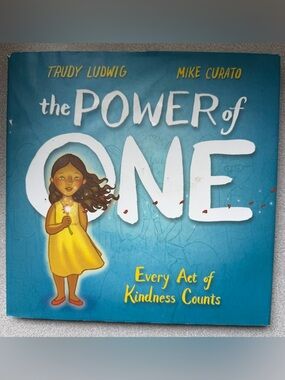 The Power of One Blue Cover with Yellow Illustrations School Class Learning